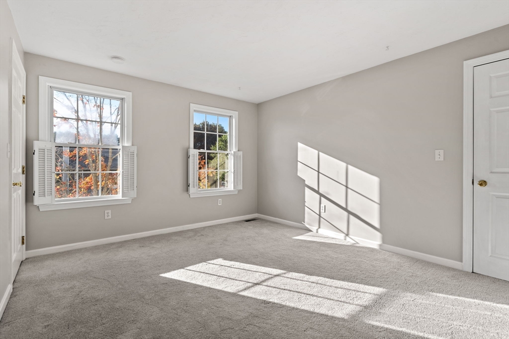 23 Morrison Lane Westford, MA 01886 - Photo 32 of 37 an empty room with windows and closet
