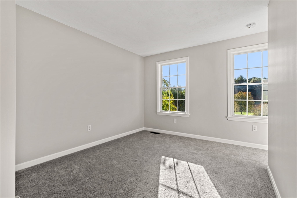 23 Morrison Lane Westford, MA 01886 - Photo 33 of 37 an empty room with windows and closet