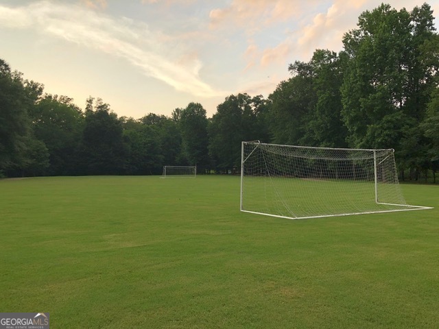 102 Gardens Drive Forsyth, GA 31029 - Photo 6 of 7 a view of a tennis court