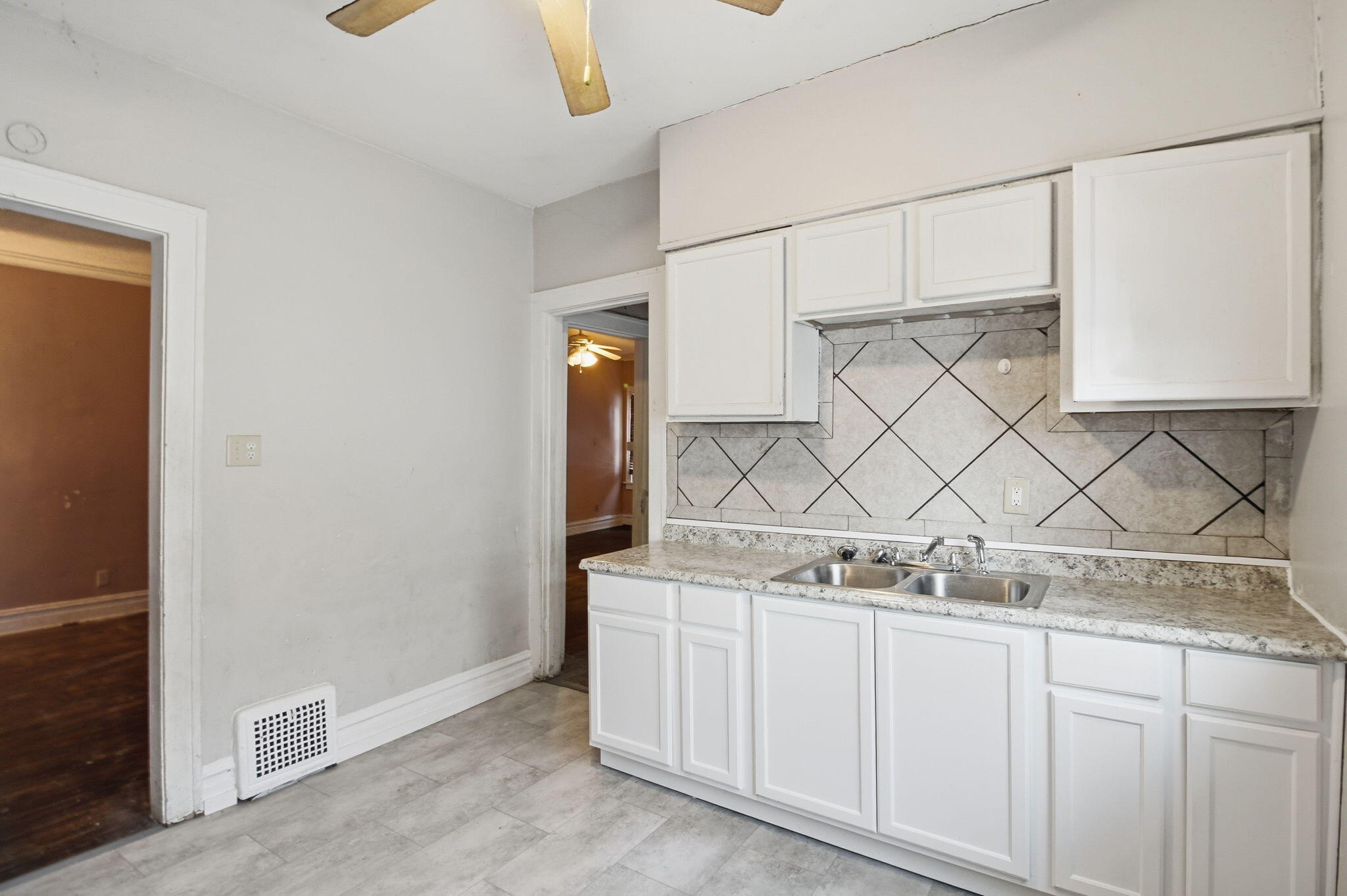 4427 Washington Street Gary, IN 46408 - Photo 5 of 9 a view of a sink and cabinets