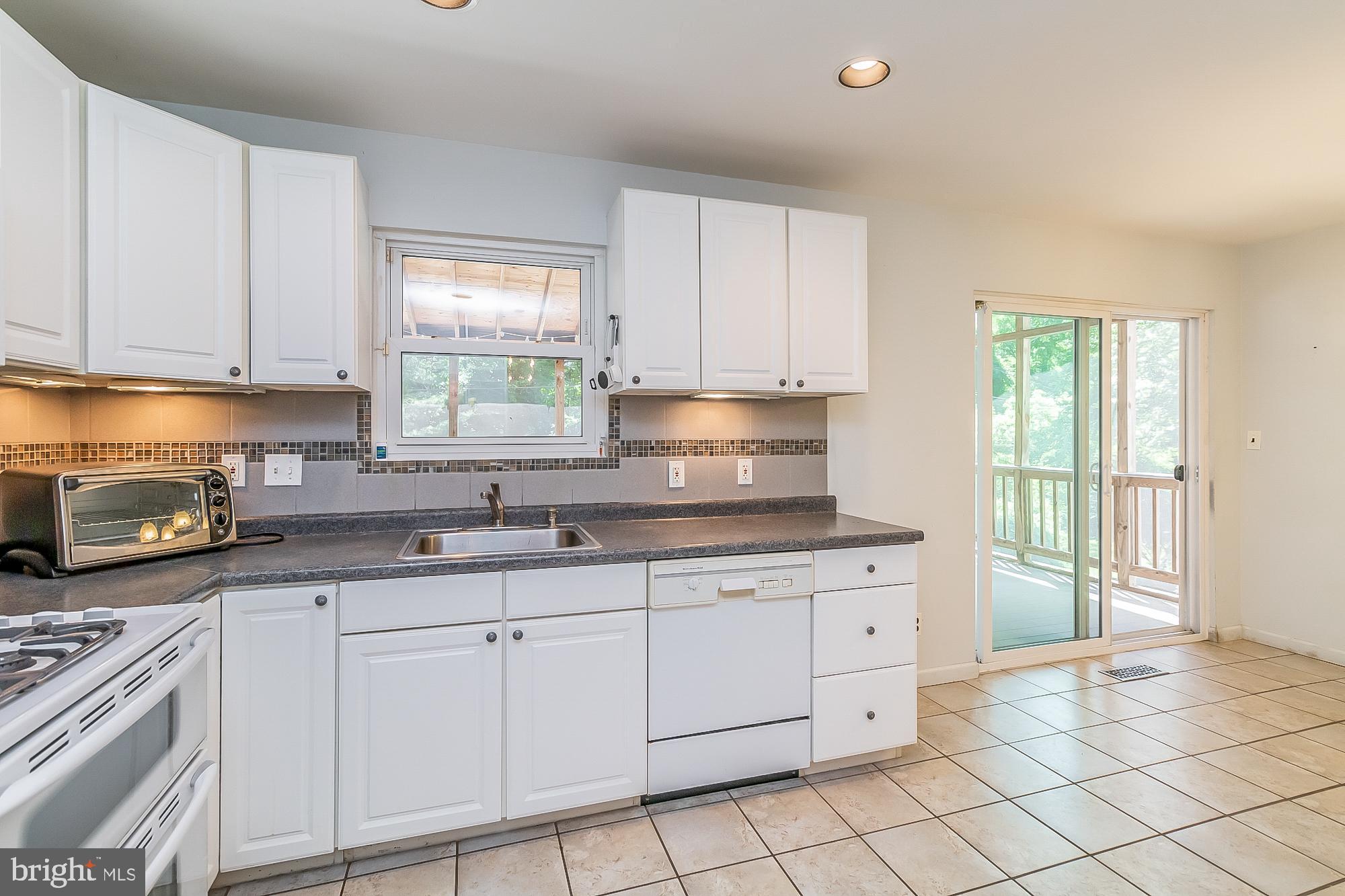 131 Chargeur Road Reisterstown, MD 21136 - Photo 23 of 58 Large kitchen With Updated Slider