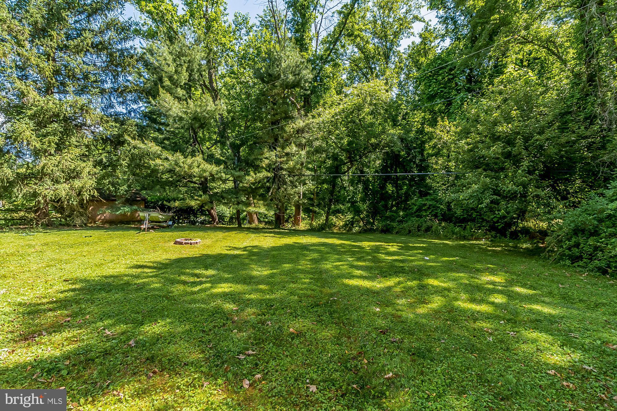131 Chargeur Road Reisterstown, MD 21136 - Photo 54 of 58 Large Rear Yard with a scenic stream