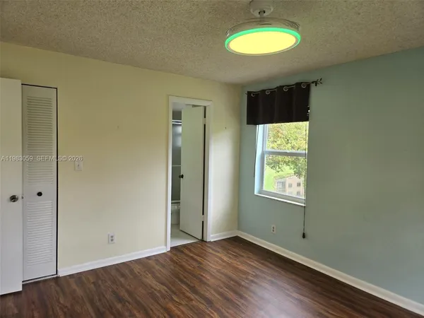 a bathroom with a sink and shower