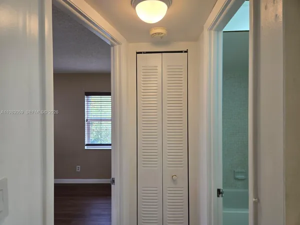 an empty room that has a window