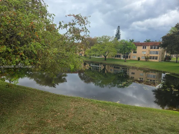 a view of a park and trees
