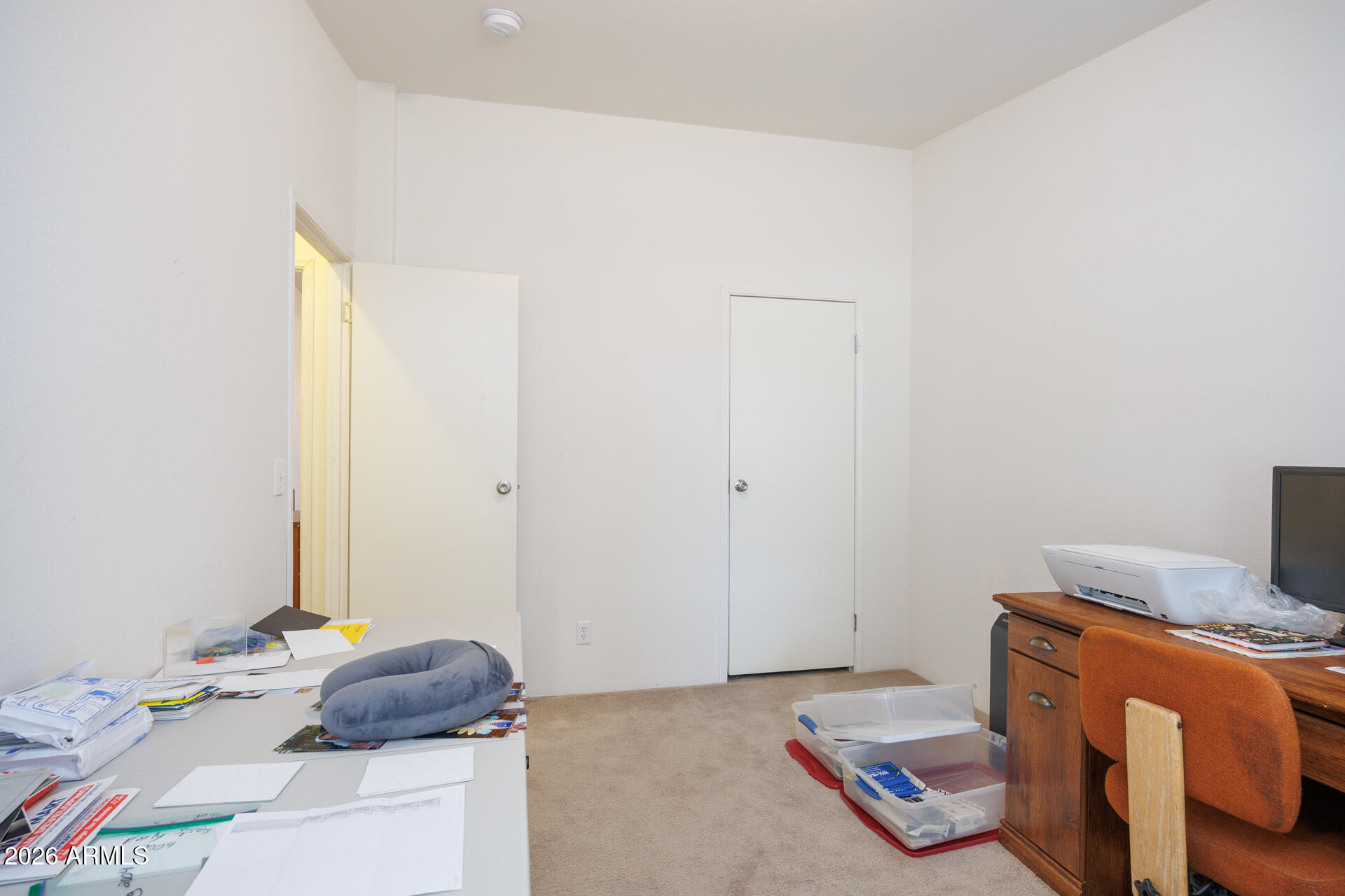 7312 North Reed Road Florence, AZ 85132 - Photo 24 of 66 a bedroom with a bed and a window