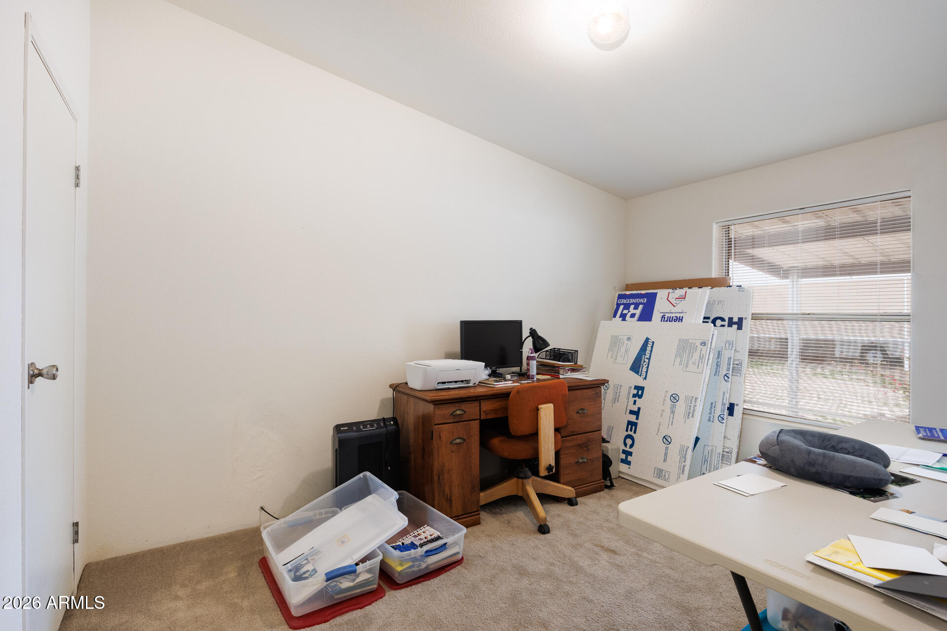 7312 North Reed Road Florence, AZ 85132 - Photo 25 of 66 a workspace with furniture and a window