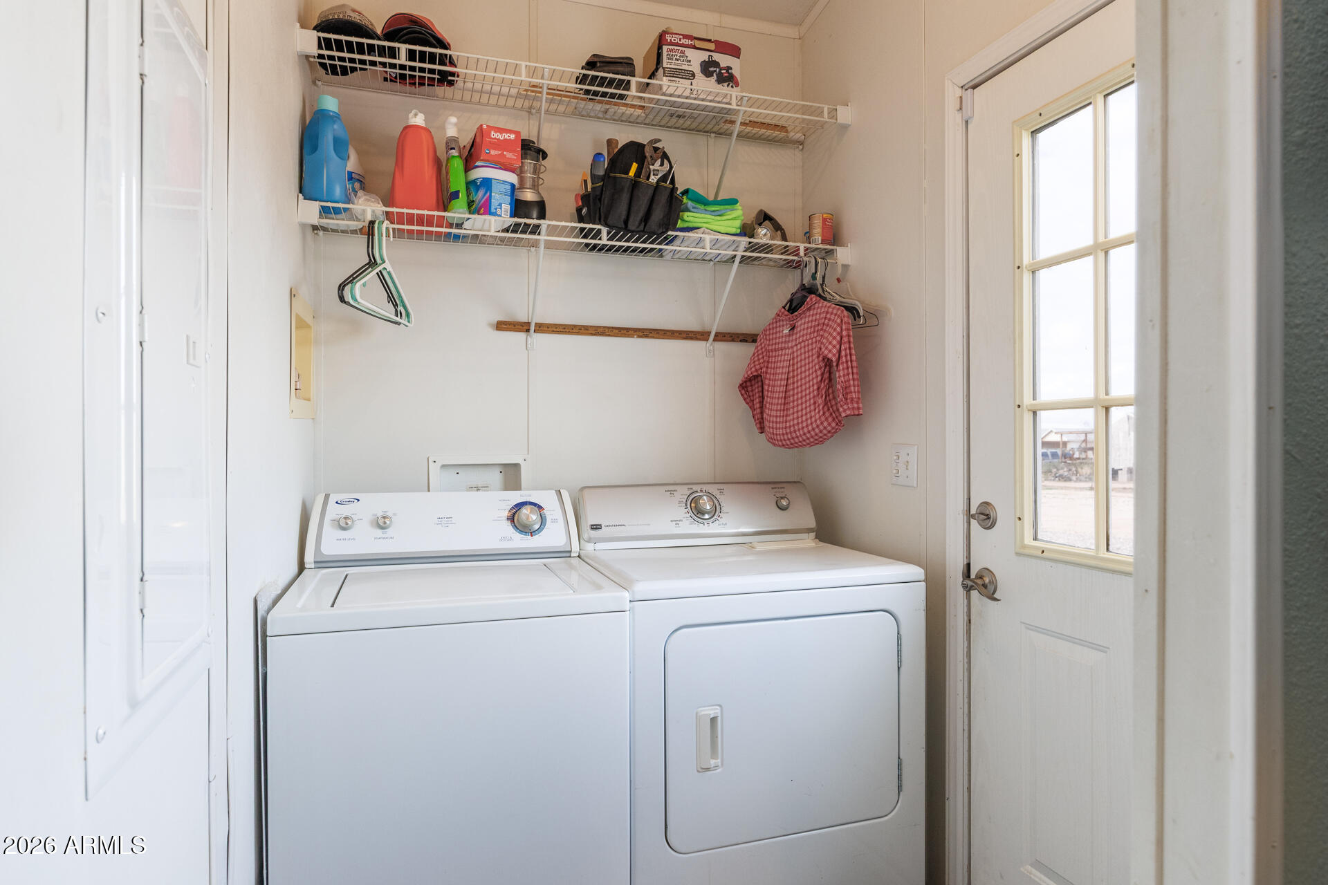 7312 North Reed Road Florence, AZ 85132 - Photo 27 of 66 a utility room with dryer and washer