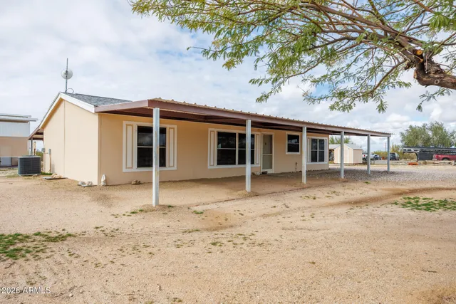 front view of a house with a patio