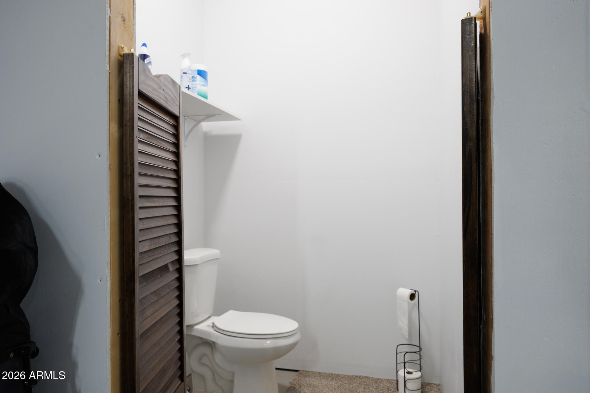 7312 North Reed Road Florence, AZ 85132 - Photo 40 of 66 a bathroom with a sink and a toilet