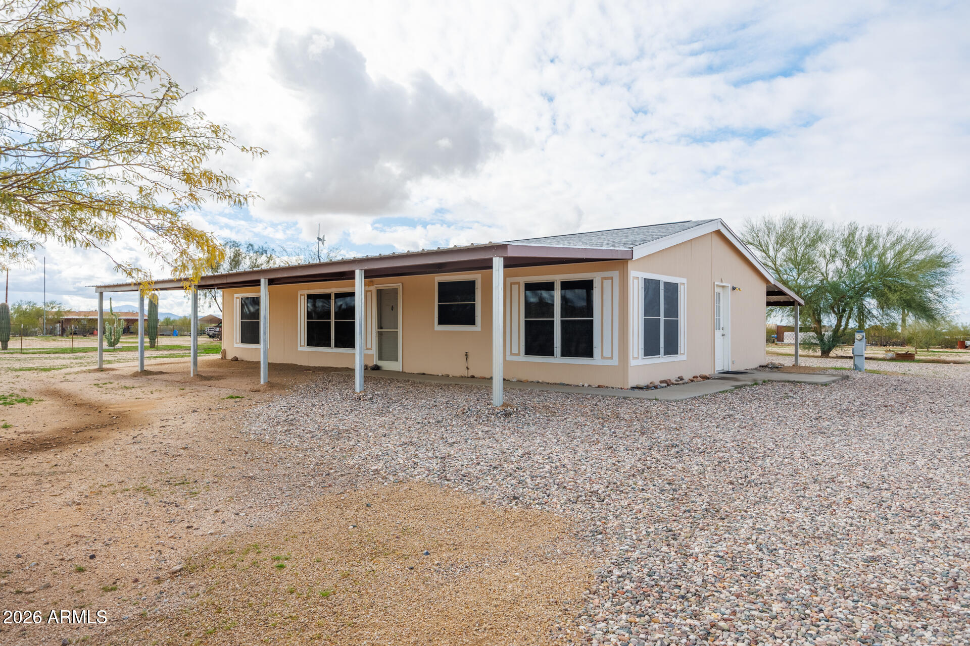 7312 North Reed Road Florence, AZ 85132 - Photo 4 of 66 a view of house with a yard