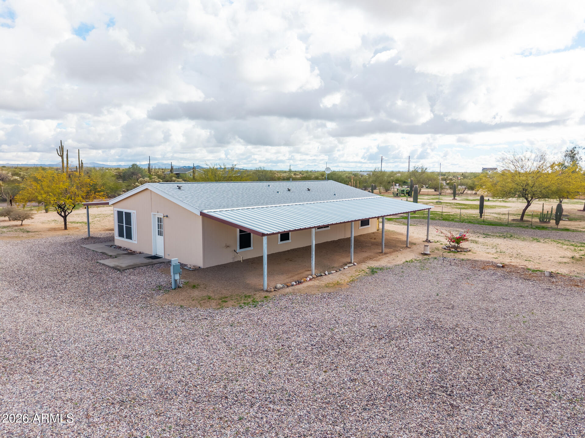 7312 North Reed Road Florence, AZ 85132 - Photo 42 of 66 a view of a terrace with a garden