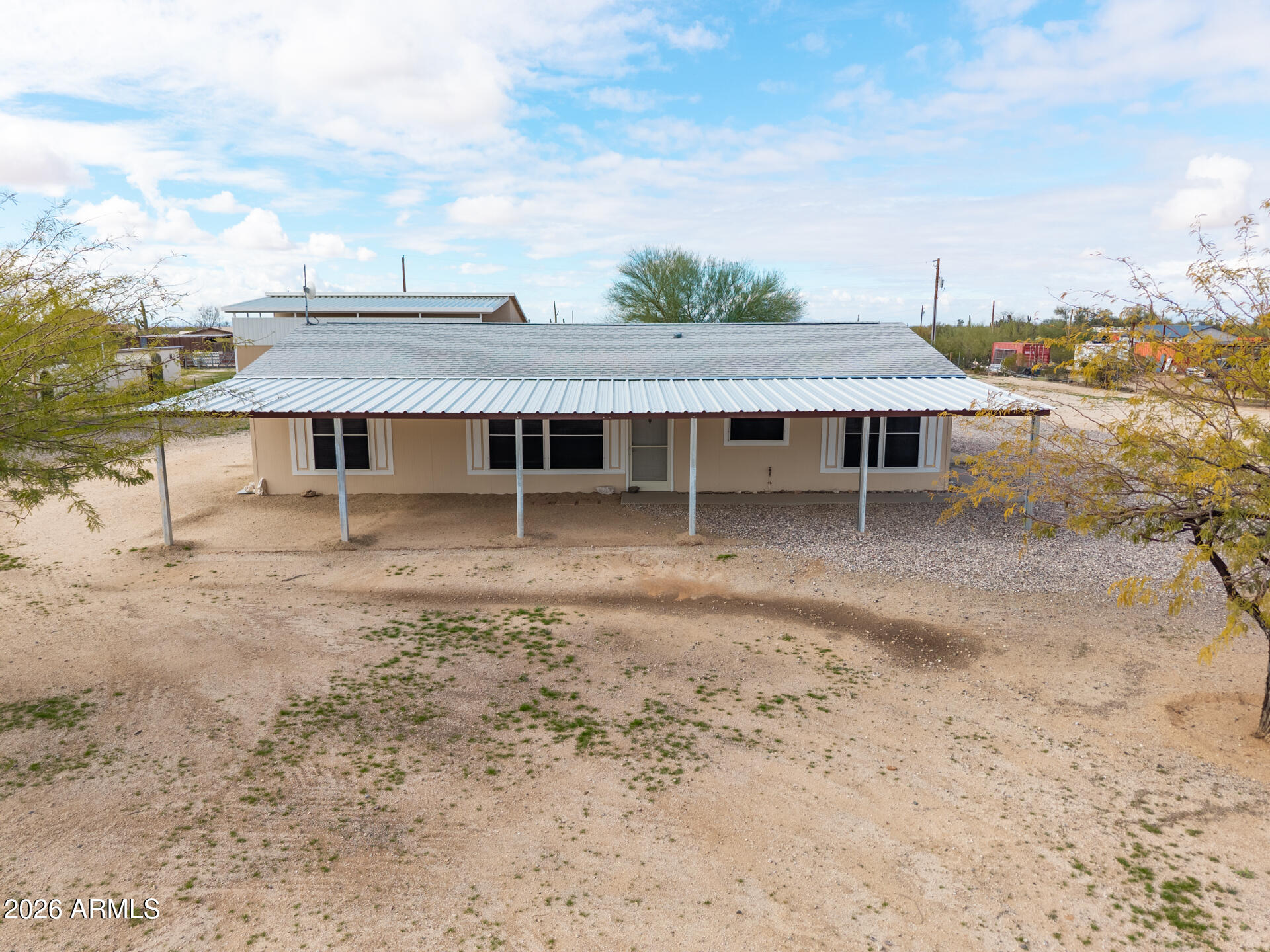 7312 North Reed Road Florence, AZ 85132 - Photo 53 of 66 a view of a house with a yard and lake view