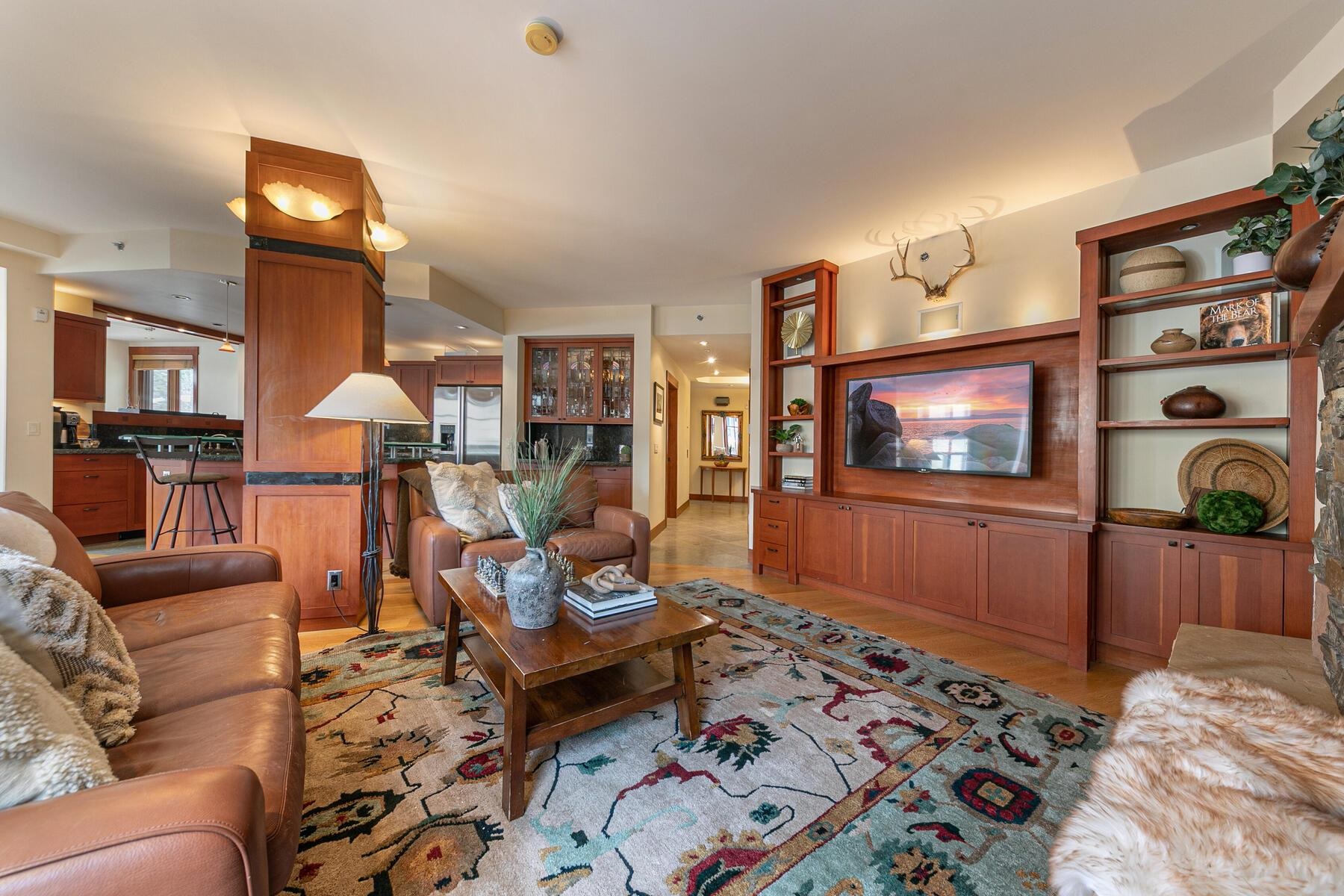 1850 Village South Road, Unit 228 Olympic Valley, CA 96146 - Photo 6 of 24 a living room with furniture and a flat screen tv