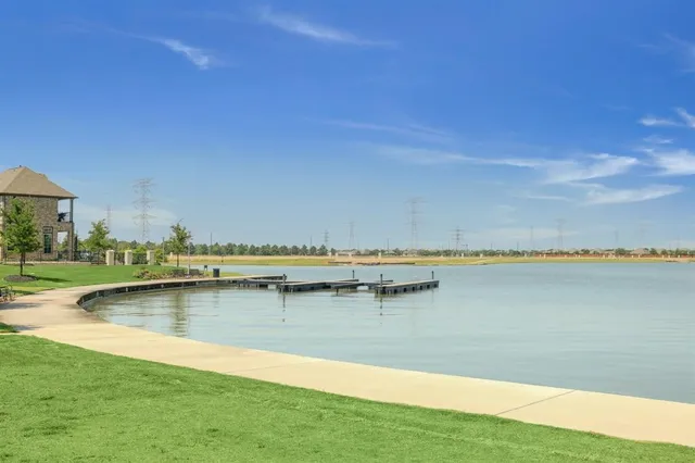 a view of a swimming pool with an ocean view