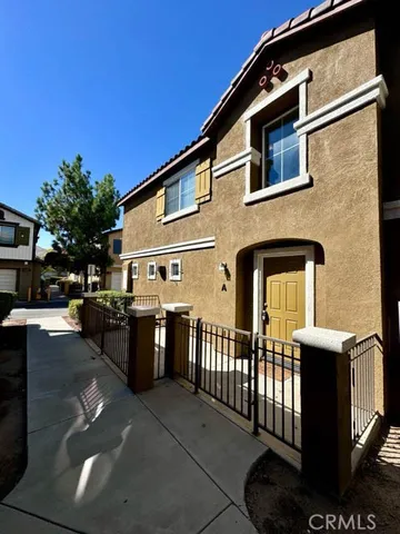 a front view of a house with parking