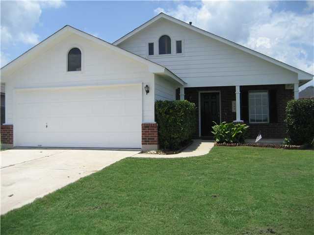 269 Spring Branch Loop Kyle, TX 78640 - Photo 1 of 1 a front view of a house with a yard