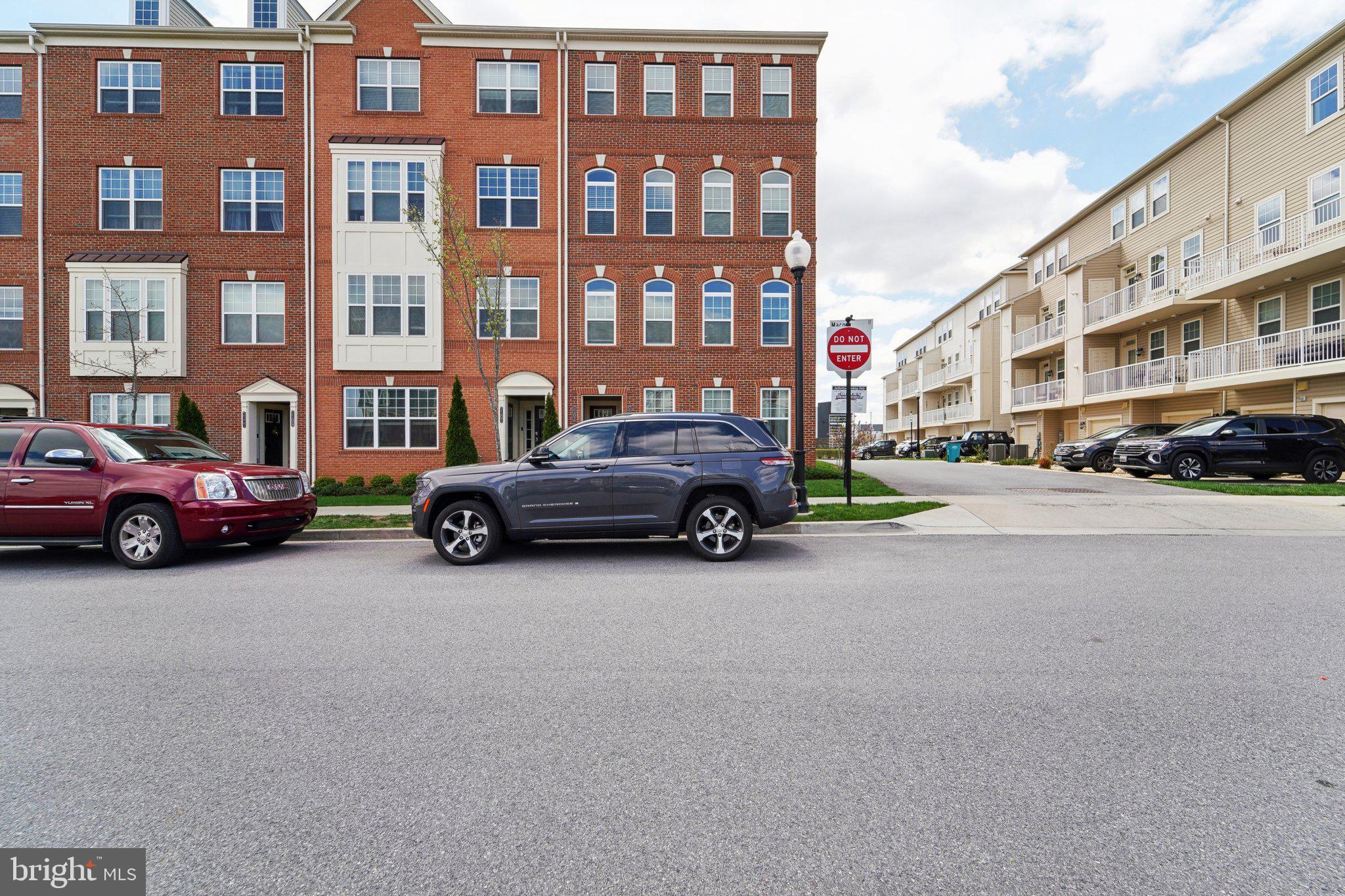 a view of a cars parked in front of a building