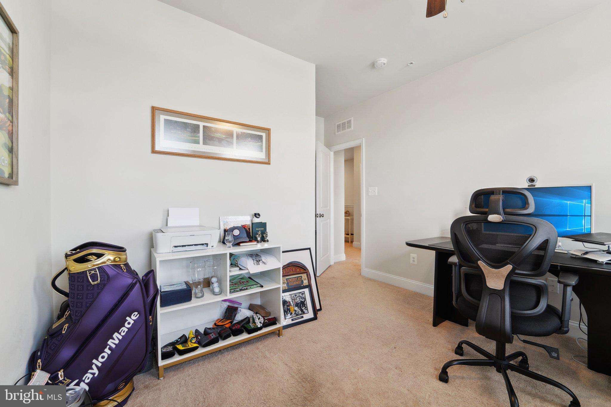 7101 Macon Street Frederick, MD 21703 - Photo 20 of 38 a view of a workspace with furniture and a window