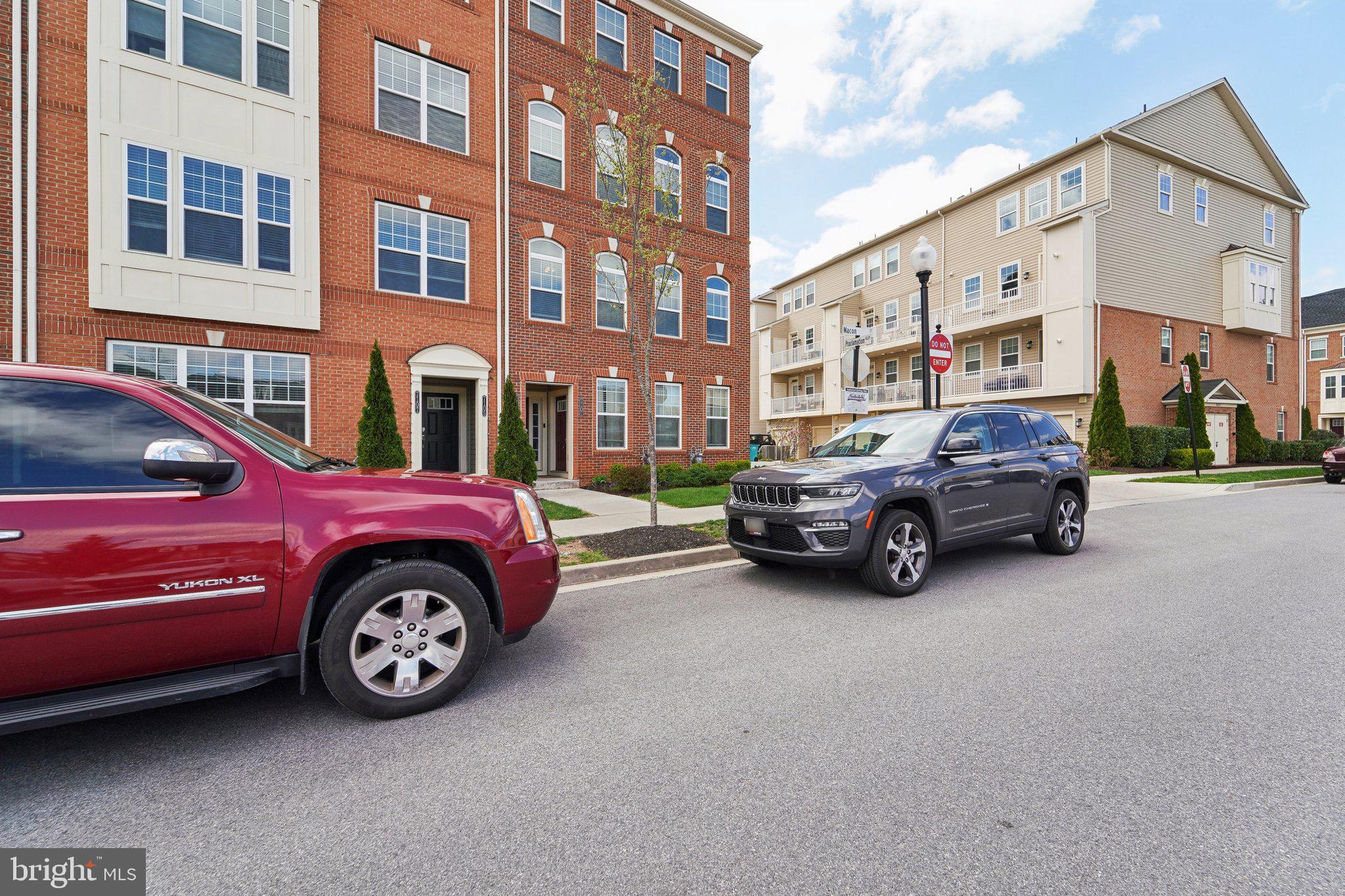 7101 Macon Street Frederick, MD 21703 - Photo 2 of 38 a car parked in front of a building