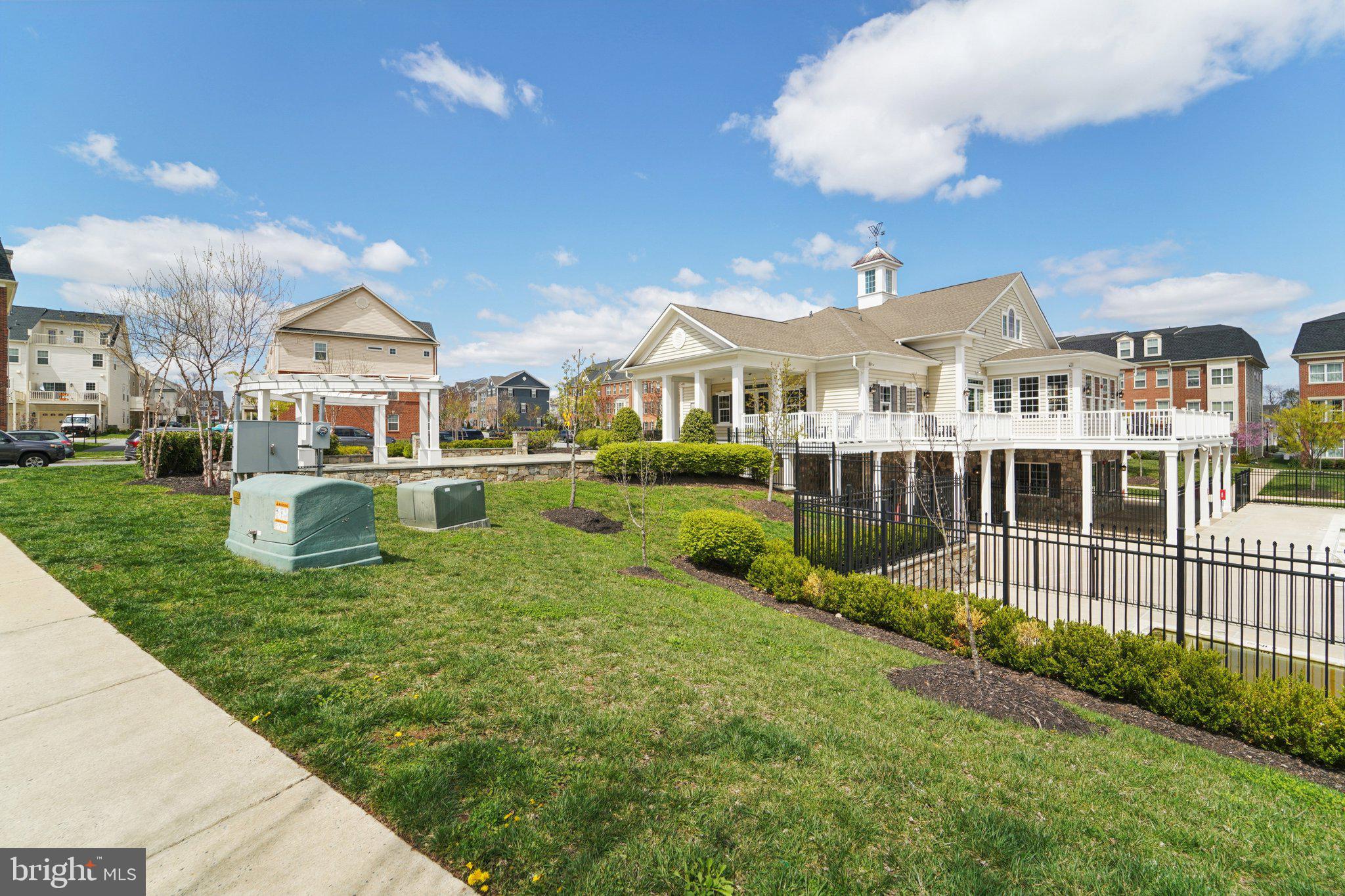 7101 Macon Street Frederick, MD 21703 - Photo 31 of 38 a front view of a house with a yard table and chairs
