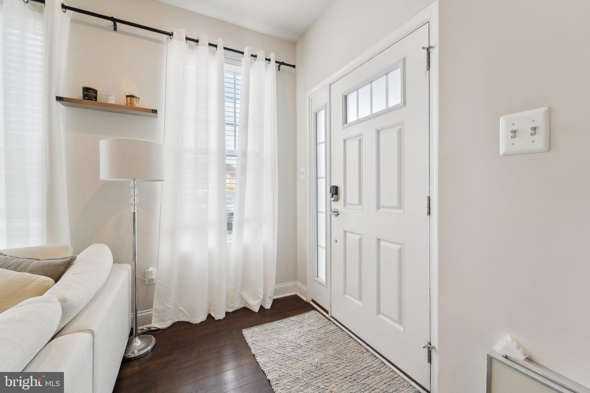 7101 Macon Street Frederick, MD 21703 - Photo 6 of 38 a view of a bathroom with wooden floor and closet area