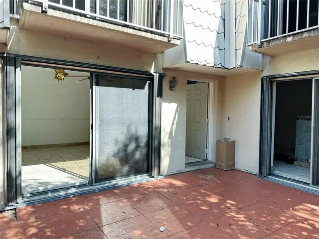 a view of a house with a tree