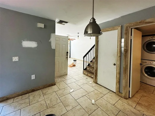 a room with fireplace and furniture