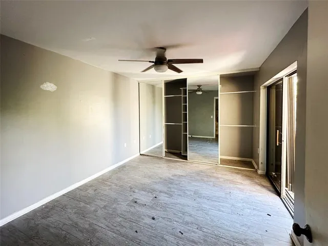 a kitchen with stainless steel appliances granite countertop a refrigerator stove and microwave