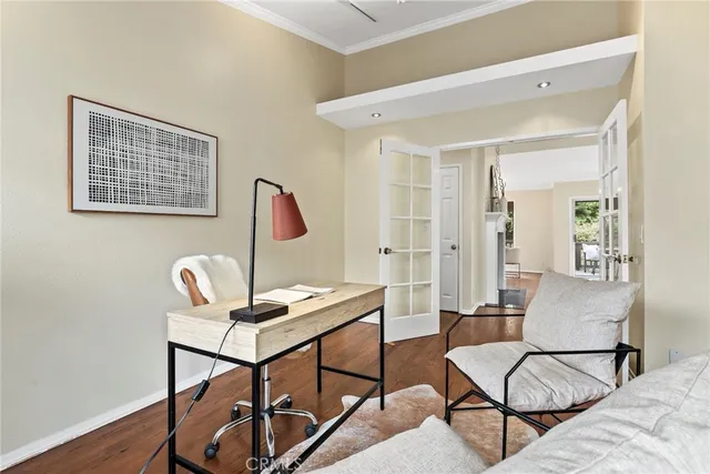 a work room with furniture and rug