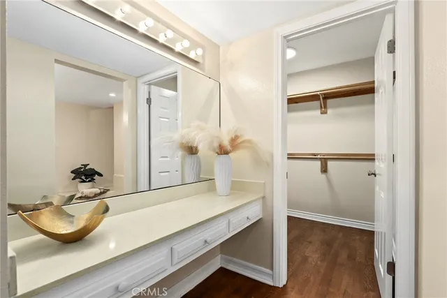 a bathroom with a tub and a sink