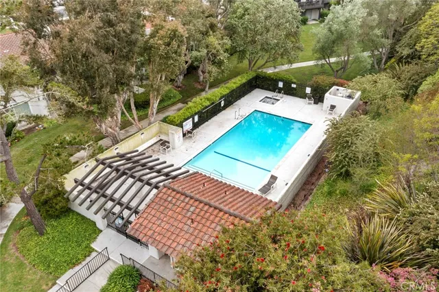 a view of a yard with chairs