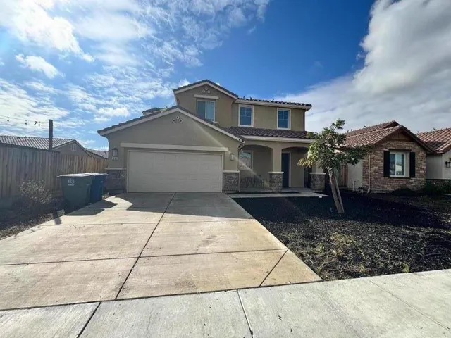 a house view with a outdoor space