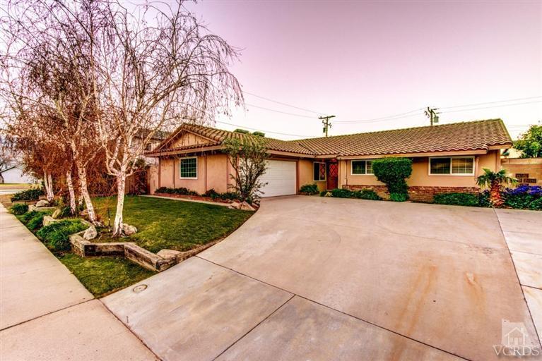 2273 Keystone Street Simi Valley, CA 93063 - Photo 1 of 29 a front view of a house with a yard and garage