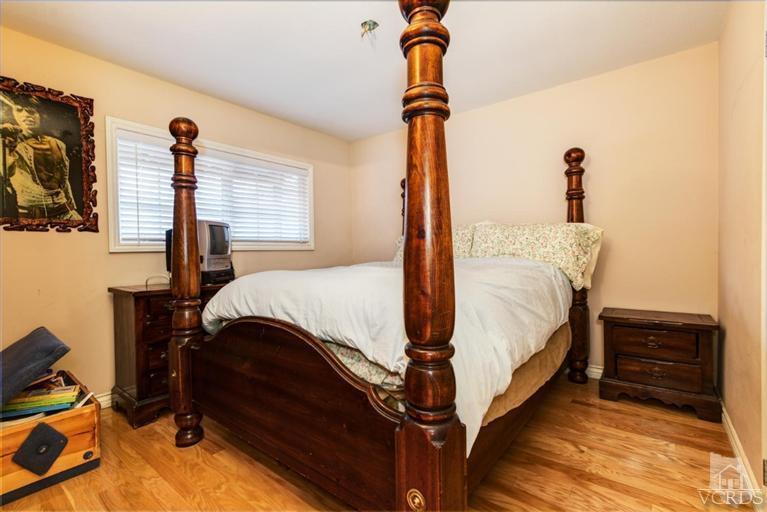 2273 Keystone Street Simi Valley, CA 93063 - Photo 22 of 29 a bedroom with a bed next to a window