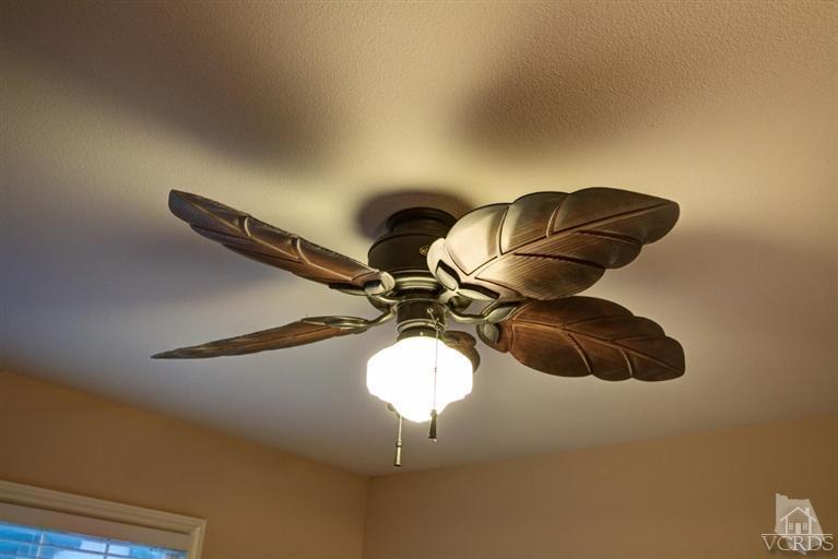 2273 Keystone Street Simi Valley, CA 93063 - Photo 24 of 29 a close view of hardwood floor and a chandelier fan