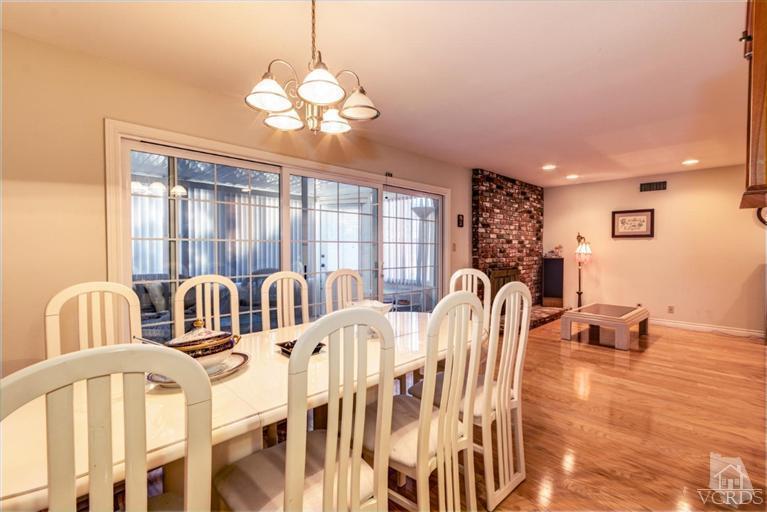 2273 Keystone Street Simi Valley, CA 93063 - Photo 6 of 29 a view of a dining room with furniture and chandelier