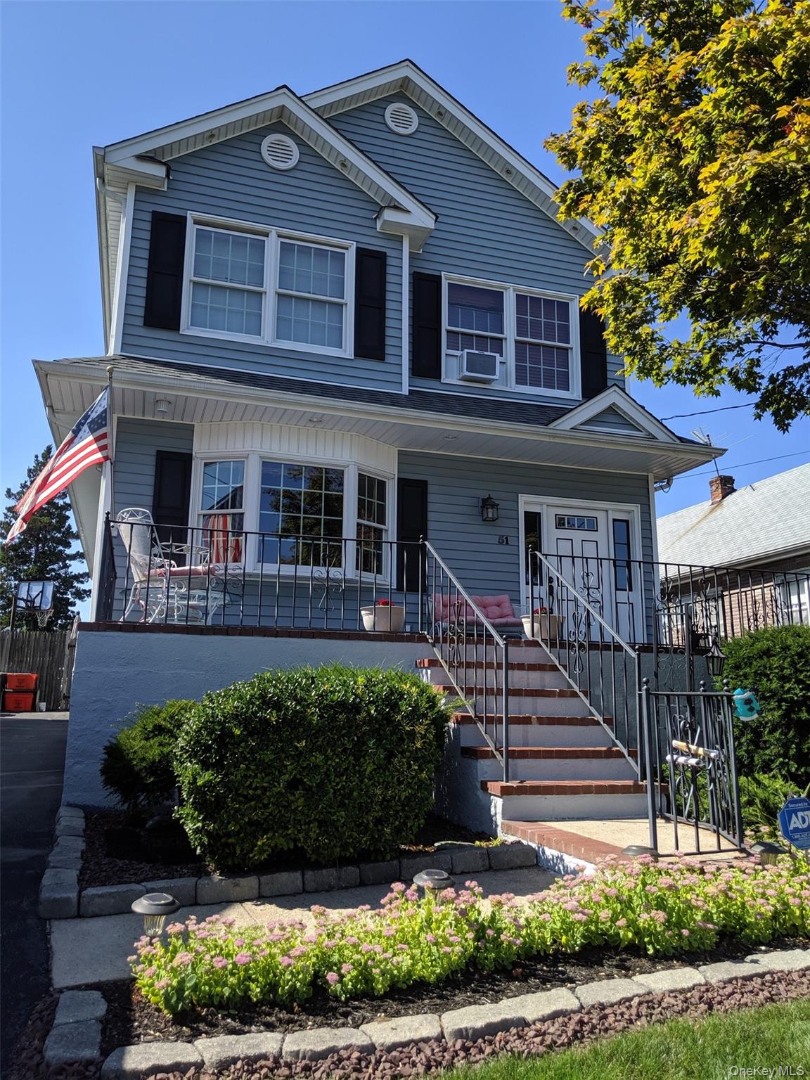 51 Pacific Street Franklin Square, NY 11010 - Photo 1 of 1 a front view of a house with a yard