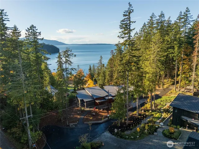 a view of a chairs and table in backyard