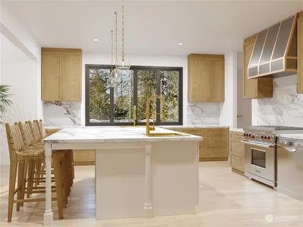 a kitchen with kitchen island granite countertop a stove and a sink