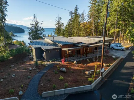 an outdoor space with seating pool