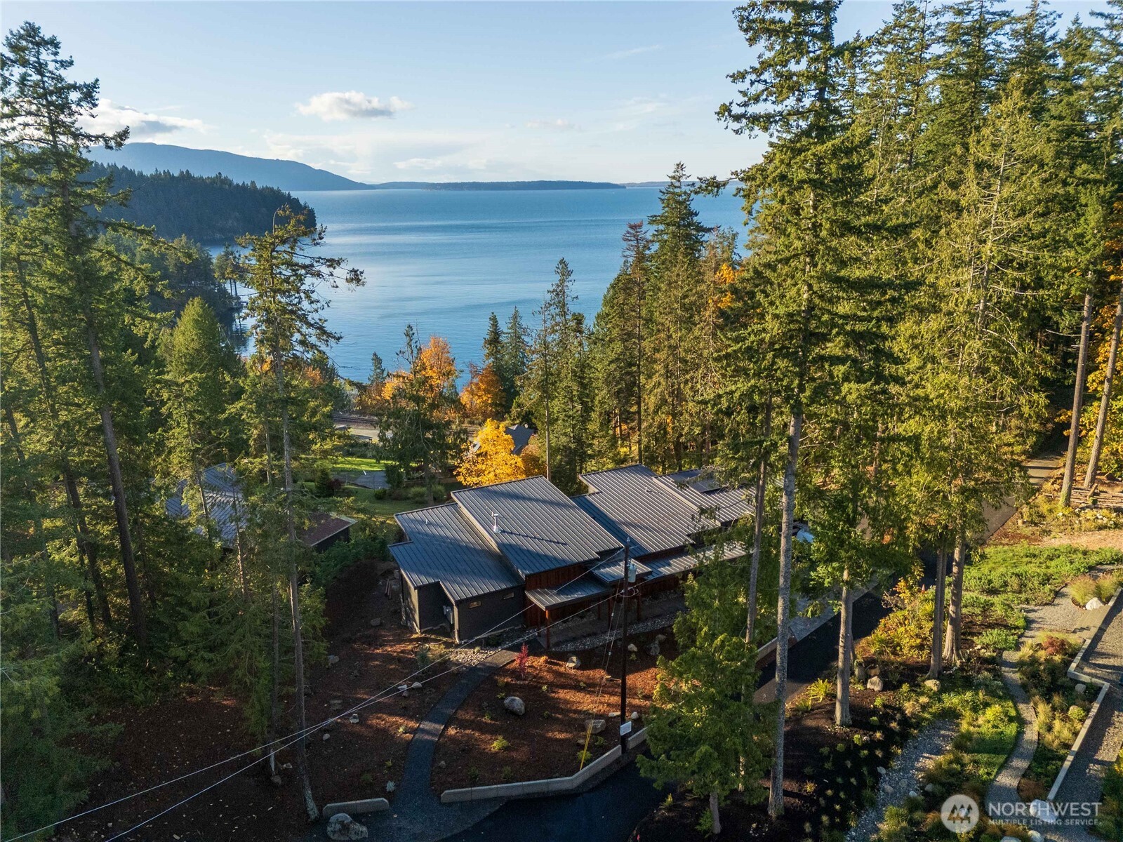 166 Soundview Road Bellingham, WA 98229 - Photo 6 of 21 a view of a chairs and table in the balcony