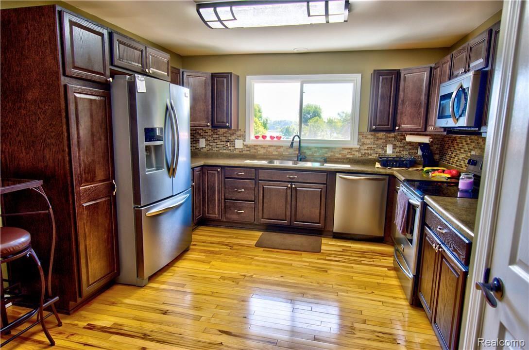 5041 Owen Road Linden, MI 48451 - Photo 4 of 51 DSC_5236_7_8_Realistic.jpg
