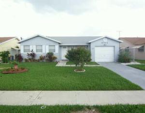9034 Southwest 7th Street Boca Raton, FL 33433 - Photo 1 of 20 Front