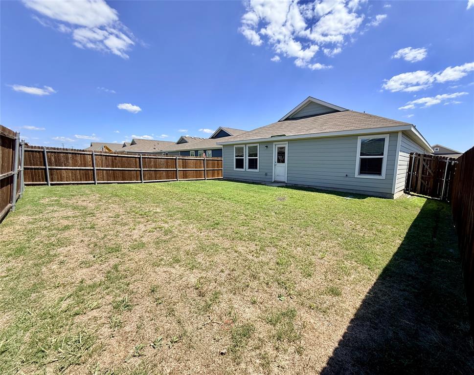 128 Honeysuckle Street Princeton, TX 75407 - Photo 16 of 19 spacious yard for entertaining