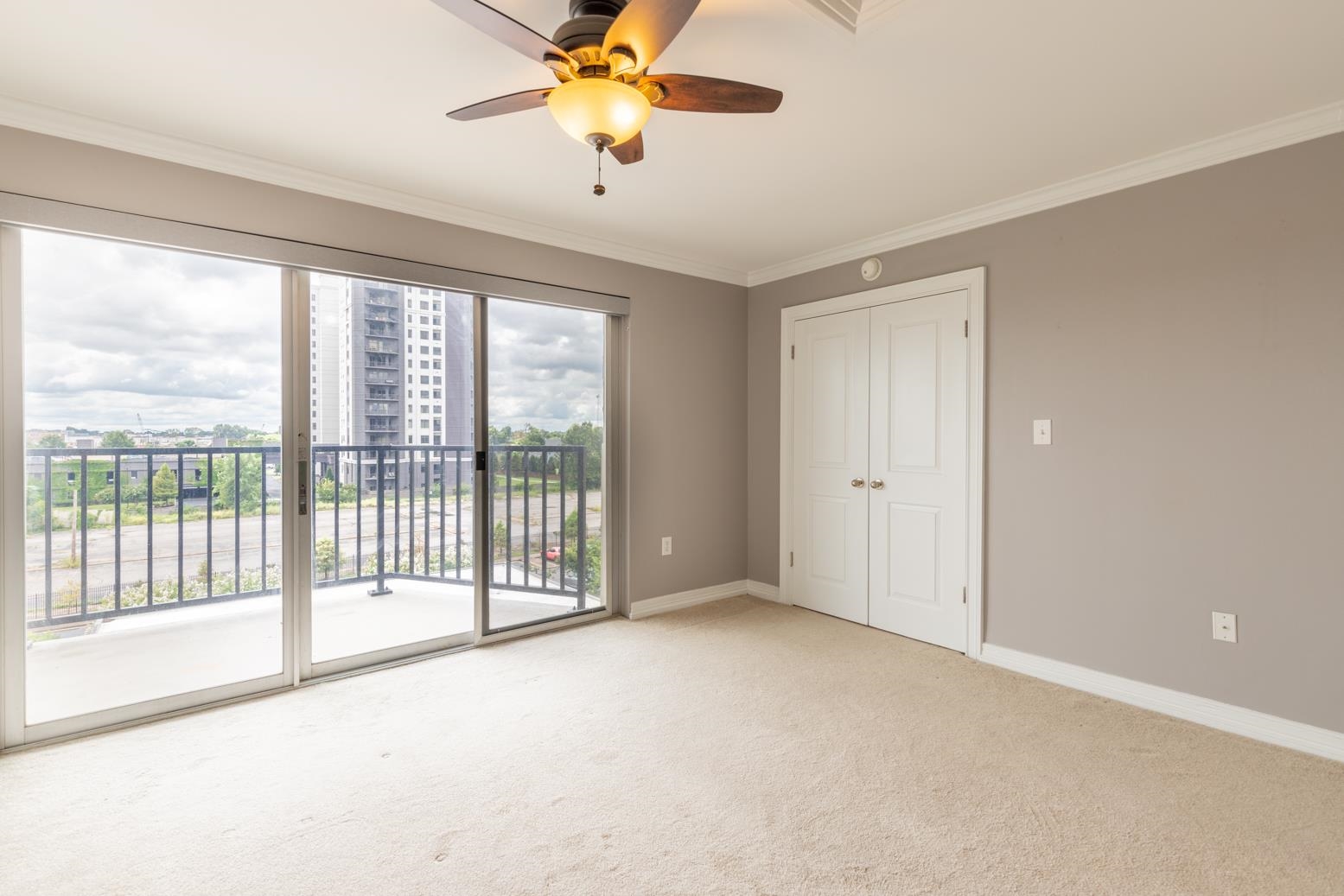 655 Riverside Drive, Unit 406B Memphis, TN 38103 - Photo 13 of 24 a view of an empty room with a window
