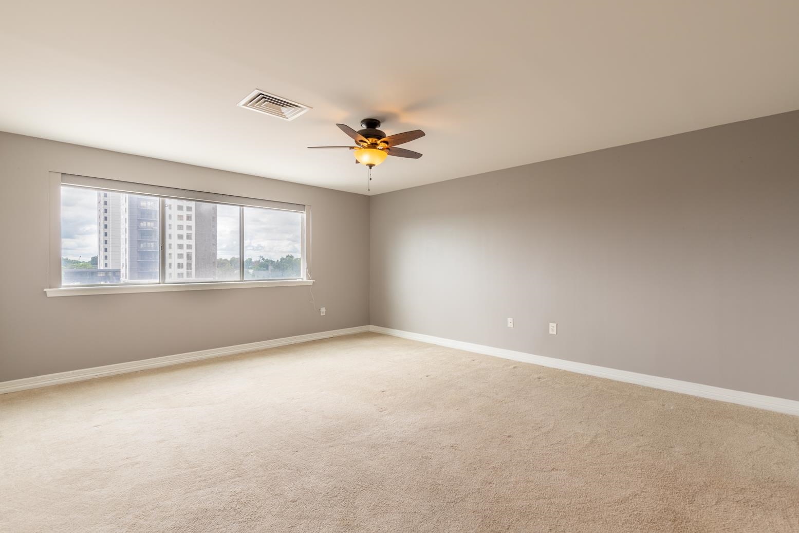 655 Riverside Drive, Unit 406B Memphis, TN 38103 - Photo 15 of 24 a view of an empty room with a window