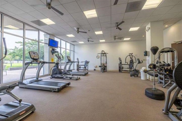 655 Riverside Drive, Unit 406B Memphis, TN 38103 - Photo 20 of 24 a view of a room with gym equipment