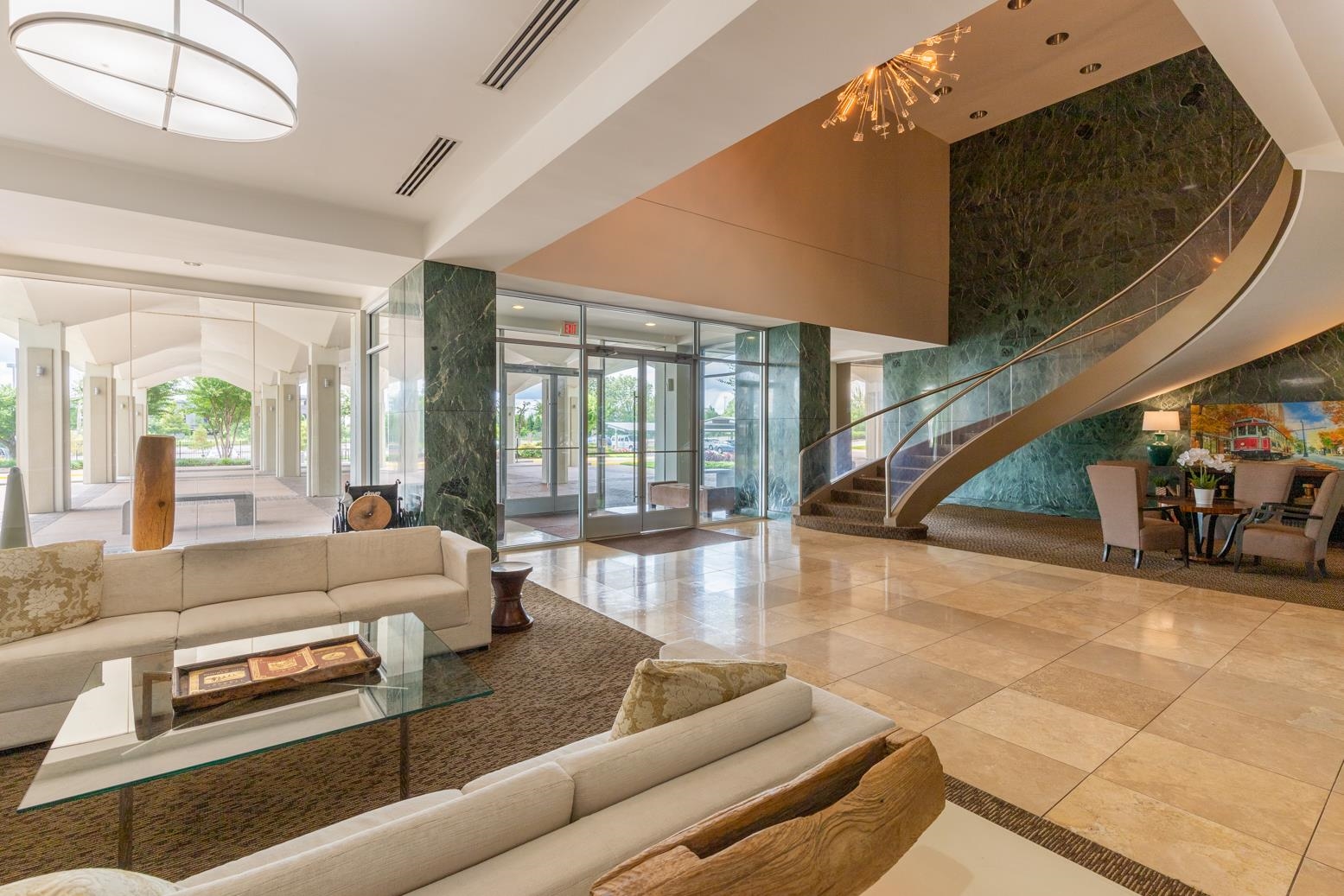 655 Riverside Drive, Unit 406B Memphis, TN 38103 - Photo 3 of 24 a living room with furniture and a large window