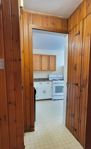 a kitchen with stainless steel appliances a refrigerator and cabinets